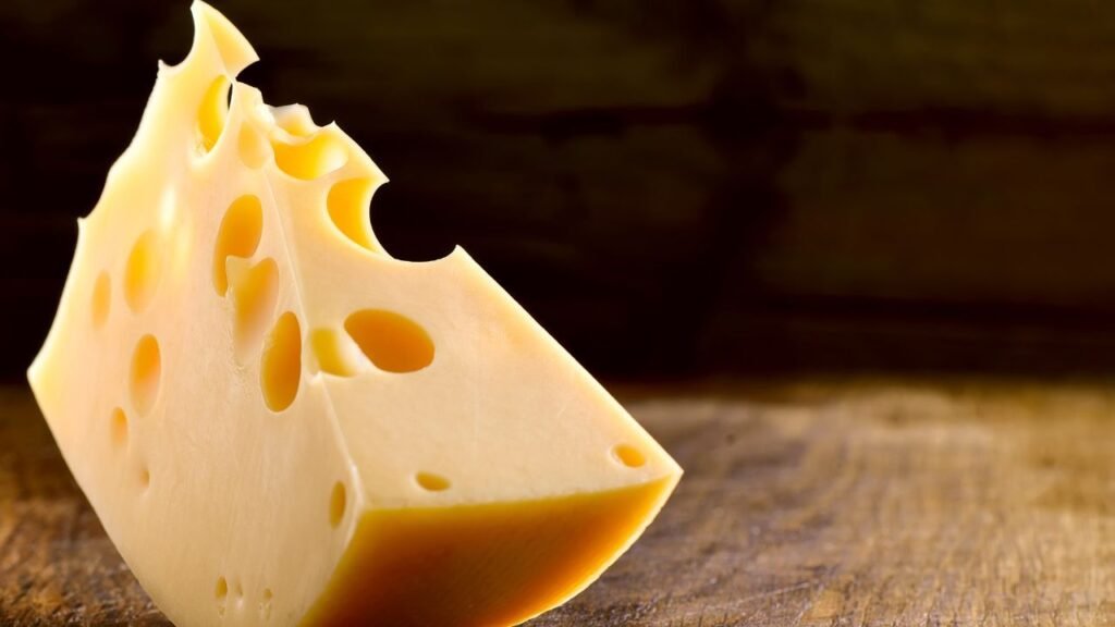 Cheese (in moderation), a calcium-rich treat that dogs enjoy.