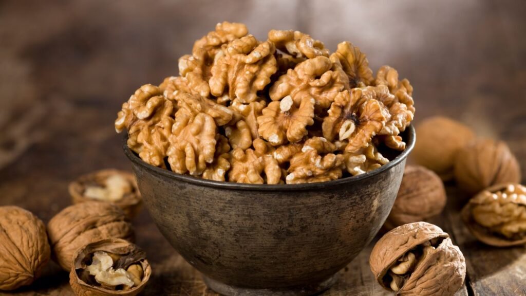 Walnuts, which can cause gastrointestinal distress, including vomiting, diarrhea, and tremors in dogs.